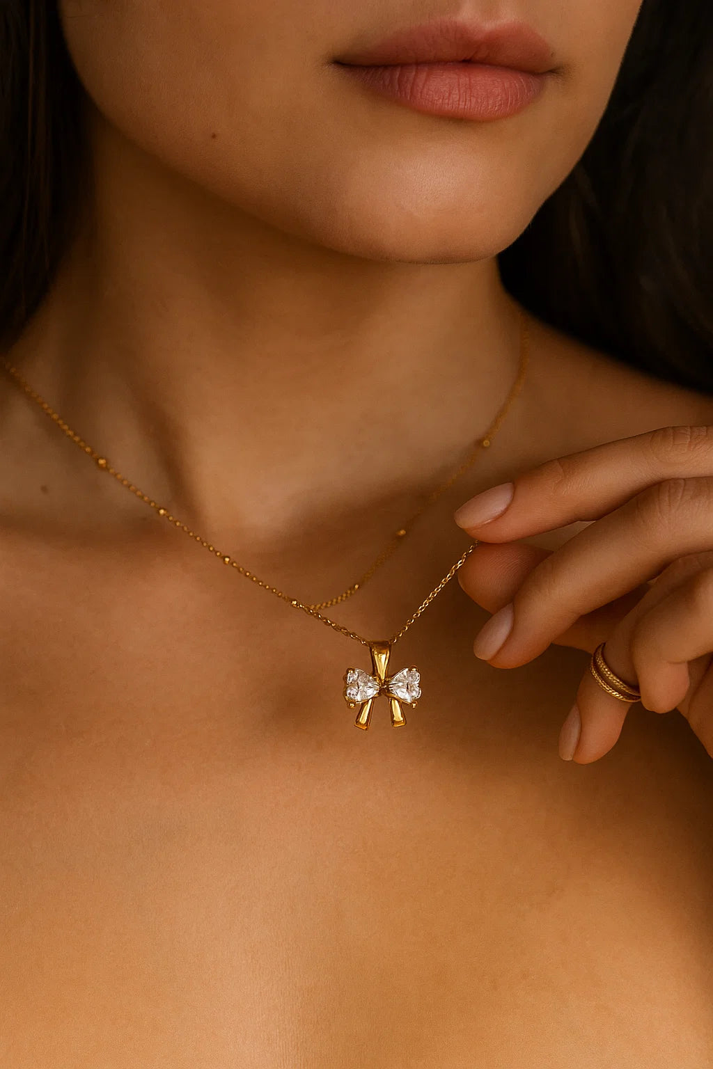 CRYSTAL BOW PENDANT