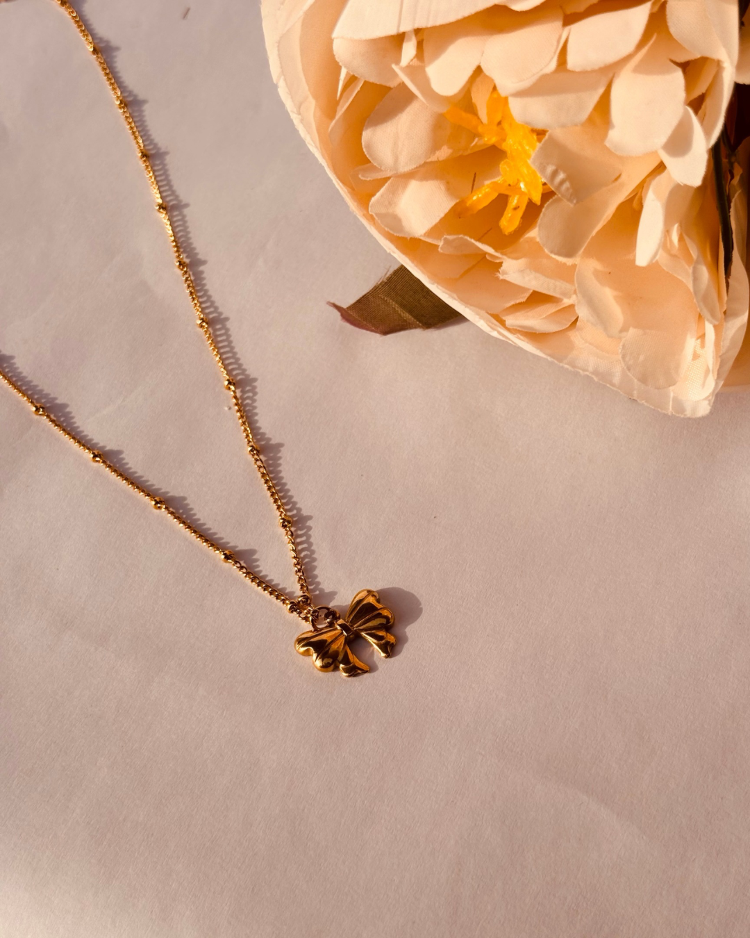BOW PENDANT
