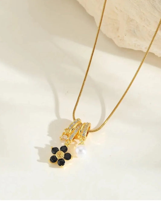 FLOWER CHARM PENDANT
