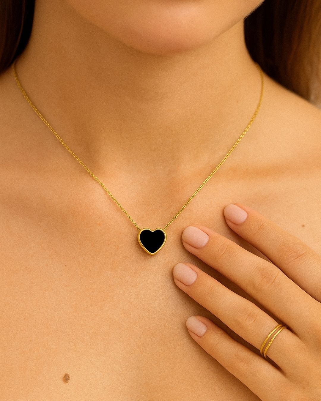 DUAL BLACK AND WHITE HEART PENDANT