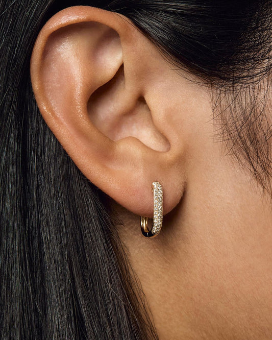 Glo anti tarnish small gold hoop earrings worn on ear