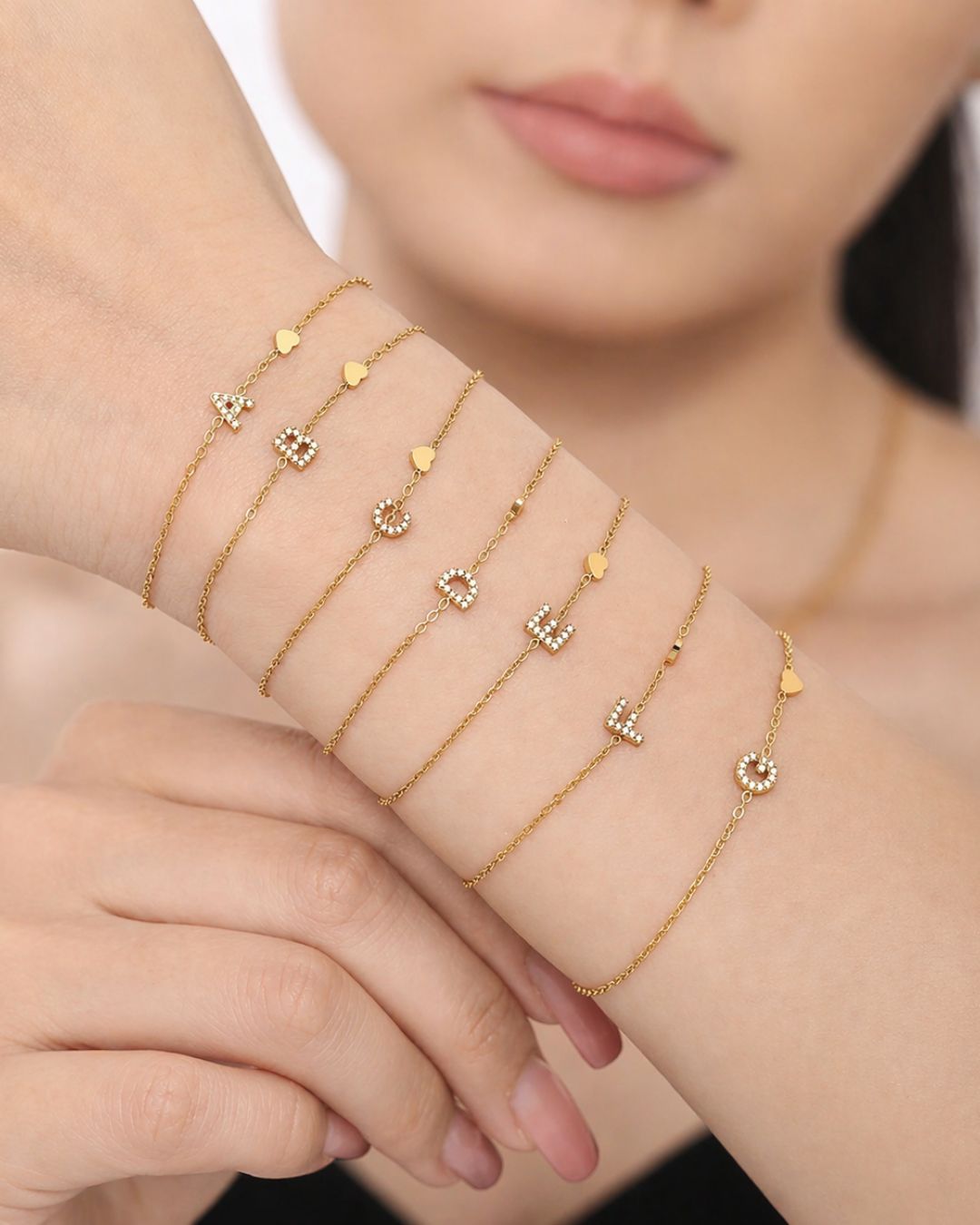 Gold initial bracelet for women worn on wrist